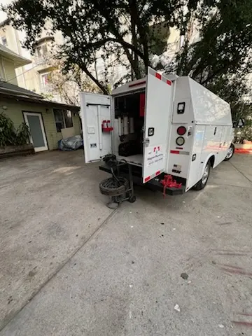 Magnet Plumbing service vehicle on-site for Grease Trap Cleaning in Villas North